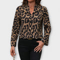 Väljä leopardikuvioinen pusero